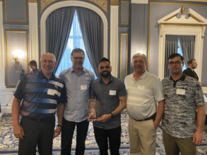 NutriScan team after accepting and award for first place in agronomics. Photographed from left to right: Jarrett Chambers, Dan Owen, Simranjit Singh, Wayne Rolston and Mark Townshend of ATP